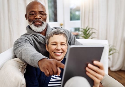 Couple using tablet