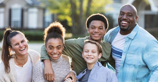 Blended family smiling