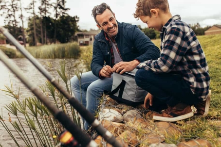a father fishing with his son