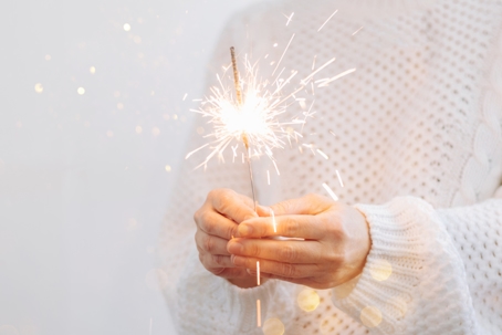 Woman holding sparkler