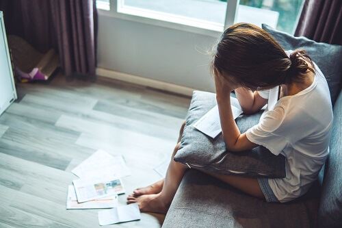 Woman in debt